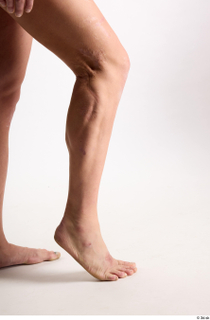 Dash  1 calf flexing nude side view 0004.jpg